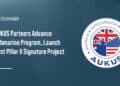 AUKUS logo. The U.S., the U.K. and Australia announced AUKUS submarine program milestones.