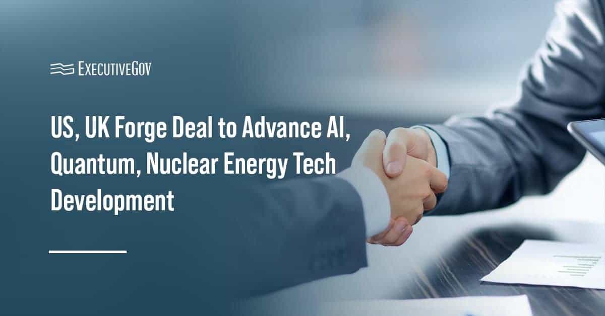 Two people shaking hands, representing partnership. The U.S. and the U.K. will collaborate on key technology R&D